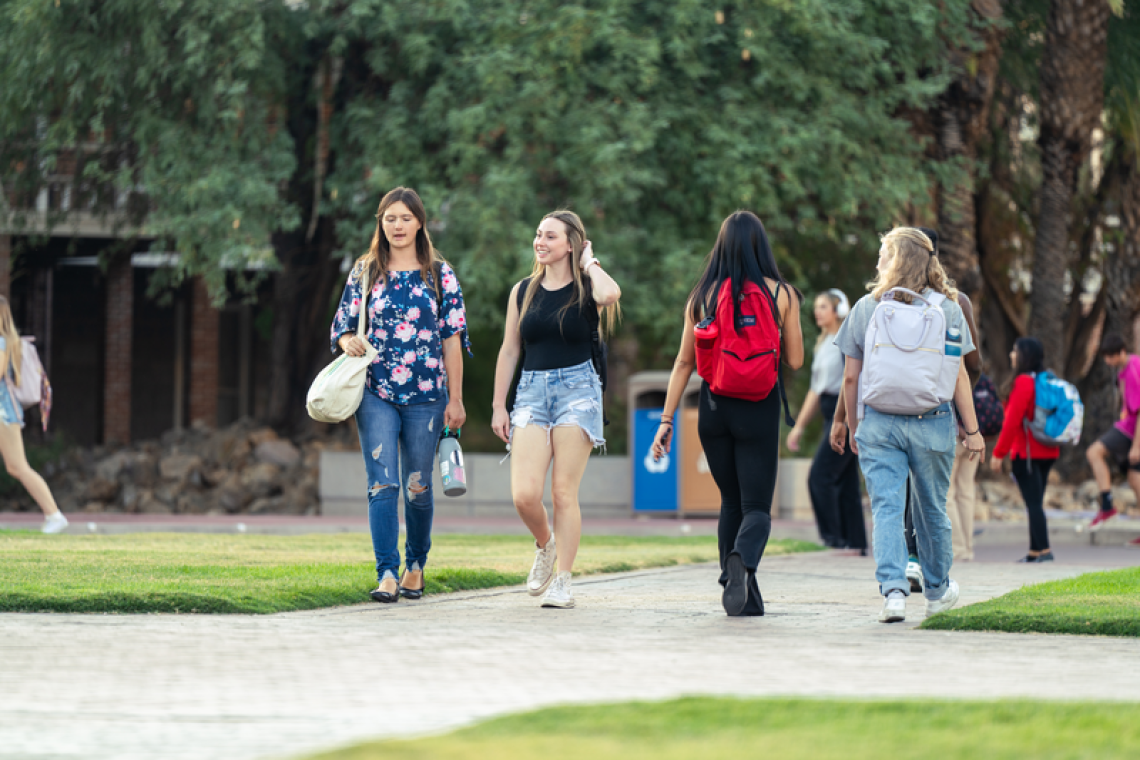 Students walking near Old Main