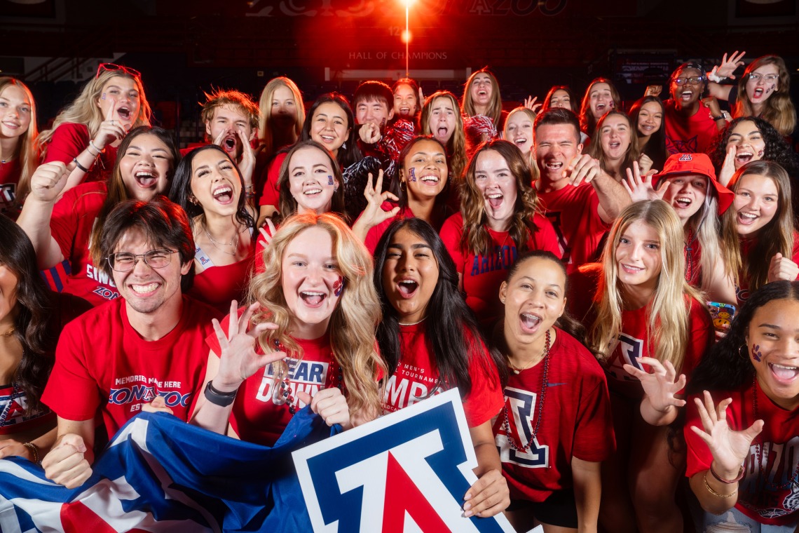 ZonaZoo students pose in red shirts